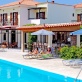 Chilling by the pool at Pela Hotel at Skala Kallonis