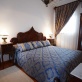 Blue King Sized Room Argentikon Luxury Suites.jpg